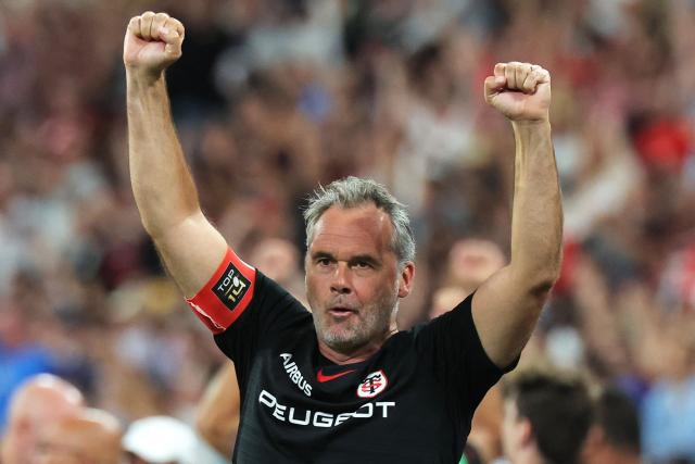Toulouse's head coach Ugo Mola celebrates after winning the French Top 14 rugby union final against Montpellier Hérault Rugby (MHR) at the Stade de France in Saint-Denis, on the outskirts of Paris, on June 27, 2026. (Photo by Kenzo TRIBOUILLARD / AFP)
