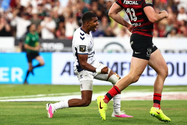 Montpellier’s French scrum-half Lйo Coly celebrates after scoring a try during the French Top 14 rugby union final between Stade Toulousain (Toulouse) and Montpellier Hйrault Rugby (MHR) at the Stade de France in Saint-Denis, on the outskirts of Paris, on June 27, 2026. (Photo by Anne-Christine POUJOULAT / AFP)