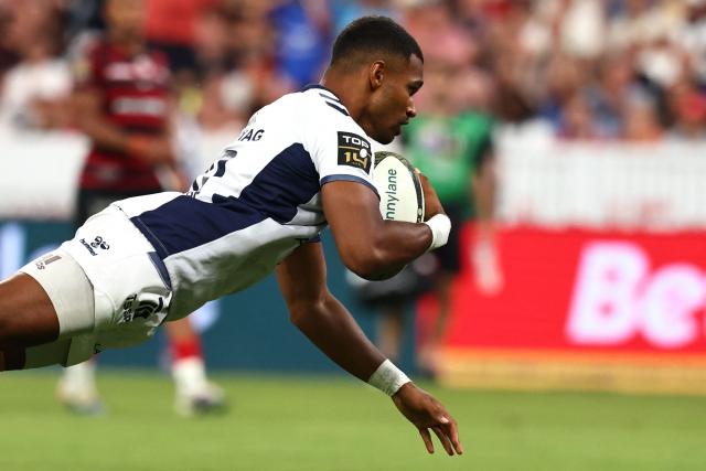 Montpellier’s French scrum?half Lйo Coly dives across the line to score a try during the French Top 14 rugby union final between Stade Toulousain (Toulouse) and Montpellier Hйrault Rugby (MHR) at the Stade de France in Saint-Denis, on the outskirts of Paris, on June 27, 2026. (Photo by Anne-Christine POUJOULAT / AFP)