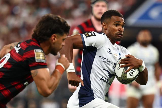 Montpellier’s French scrum-half Lйo Coly runs to score a try during the French Top 14 rugby union final between Stade Toulousain (Toulouse) and Montpellier Hйrault Rugby (MHR) at the Stade de France in Saint-Denis, on the outskirts of Paris, on June 27, 2026. (Photo by Anne-Christine POUJOULAT / AFP)