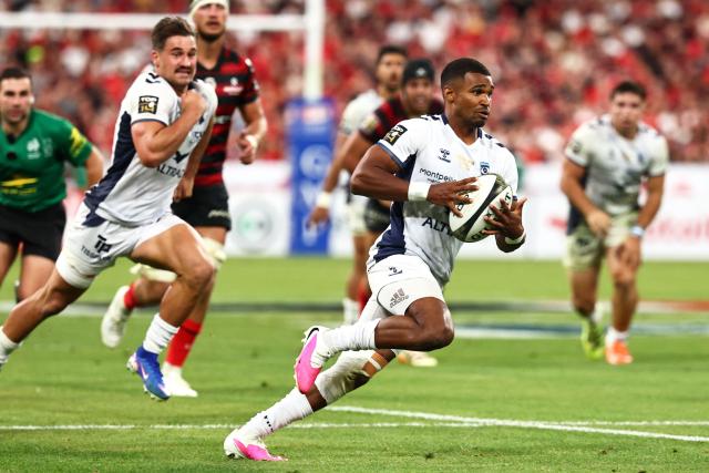 Montpellier’s French scrum-half Lйo Coly runs to score a try during the French Top 14 rugby union final between Stade Toulousain (Toulouse) and Montpellier Hйrault Rugby (MHR) at the Stade de France in Saint-Denis, on the outskirts of Paris, on June 27, 2026. (Photo by Anne-Christine POUJOULAT / AFP)