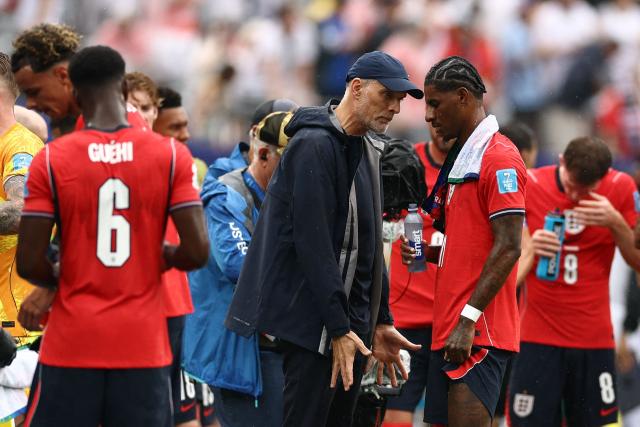 England's German head coach Thomas Tuchel and forward #11 Marcus Rashford talk during the hydration break of the 2026 World Cup Group L football match between Panama and England at the New York/New Jersey Stadium in East Rutherford on June 27, 2026.  (Photo by CHARLY TRIBALLEAU / AFP)