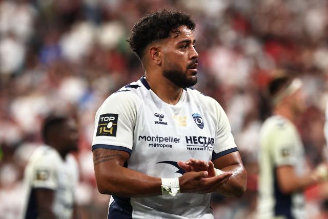 Montpellier’s Australian flanker Alexander Masibaka reacts after losing the French Top 14 rugby union final against Stade Toulousain (Toulouse) at the Stade de France in Saint-Denis, on the outskirts of Paris, on June 27, 2026. (Photo by Anne-Christine POUJOULAT / AFP)