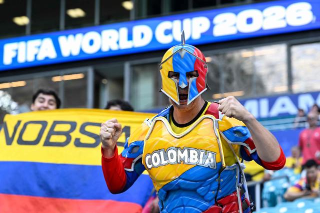 A Colombian fan wearing armour poses for a photo ahead of the 2026 World Cup Group K football match between Colombia and Portugal at the Miami Stadium in Miami Gardens on June 27, 2026.  (Photo by ROBERTO SCHMIDT / AFP)