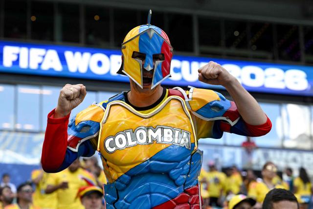 A Colombian fan wearing armour poses for a photo ahead of the 2026 World Cup Group K football match between Colombia and Portugal at the Miami Stadium in Miami Gardens on June 27, 2026.  (Photo by ROBERTO SCHMIDT / AFP)