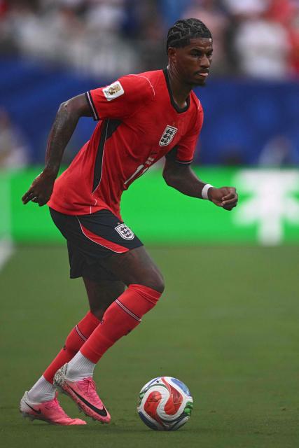England's forward #11 Marcus Rashford runs with the ball during the 2026 World Cup Group L football match between Panama and England at the New York/New Jersey Stadium in East Rutherford on June 27, 2026.  (Photo by MAURO PIMENTEL / AFP)