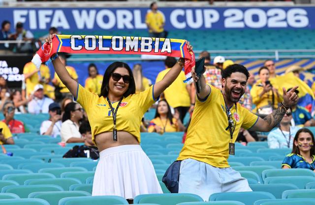 Colombian fans cheer ahead of the 2026 World Cup Group K football match between Colombia and Portugal at the Miami Stadium in Miami Gardens on June 27, 2026.  (Photo by ROBERTO SCHMIDT / AFP)