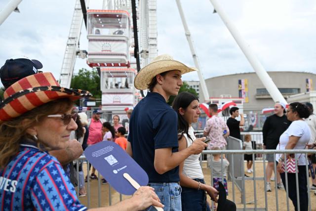 People attend the “Great American State Fair" on the National Mall in Washington, DC, on June 27, 2026. "The Great American State Fair" is an exhibition of US traditions, its people and culture to celebrate the 250th anniversary of the United States' Declaration of Independence. (Photo by Alex WROBLEWSKI / AFP)