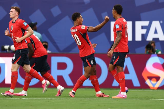 England's midfielder #10 Jude Bellingham (C) celebrates scoring his team's first goal during the 2026 World Cup Group L football match between Panama and England at the New York/New Jersey Stadium in East Rutherford on June 27, 2026.  (Photo by CHARLY TRIBALLEAU / AFP)