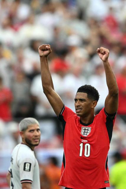 England's midfielder #10 Jude Bellingham celebrates scoring his team's first goal during the 2026 World Cup Group L football match between Panama and England at the New York/New Jersey Stadium in East Rutherford on June 27, 2026.  (Photo by MAURO PIMENTEL / AFP)