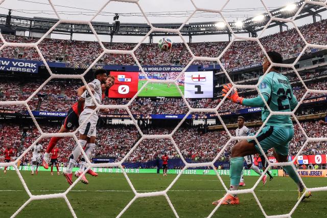 England's forward #09 Harry Kane scores his team's second goal past Panama's goalkeeper #22 Orlando Mosquera during the 2026 World Cup Group L football match between Panama and England at the New York/New Jersey Stadium in East Rutherford on June 27, 2026.  (Photo by CHARLY TRIBALLEAU / AFP)