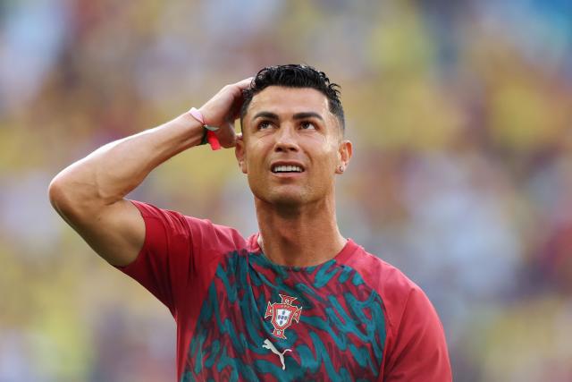 Portugal's forward #07 Cristiano Ronaldo gestures as he takes part in the warm-up ahead of the 2026 World Cup Group K football match between Colombia and Portugal at the Miami Stadium in Miami Gardens on June 27, 2026.  (Photo by PATRICIA DE MELO MOREIRA / AFP)