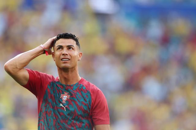 Portugal's forward #07 Cristiano Ronaldo warms up ahead of the 2026 World Cup Group K football match between Colombia and Portugal at the Miami Stadium in Miami Gardens on June 27, 2026.  (Photo by PATRICIA DE MELO MOREIRA / AFP)