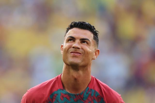 Portugal's forward #07 Cristiano Ronaldo gestures as he takes part in the warm-up ahead of the 2026 World Cup Group K football match between Colombia and Portugal at the Miami Stadium in Miami Gardens on June 27, 2026.  (Photo by PATRICIA DE MELO MOREIRA / AFP)