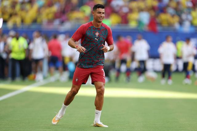 Portugal's forward #07 Cristiano Ronaldo takes part in the warm-up ahead of the 2026 World Cup Group K football match between Colombia and Portugal at the Miami Stadium in Miami Gardens on June 27, 2026.  (Photo by PATRICIA DE MELO MOREIRA / AFP)