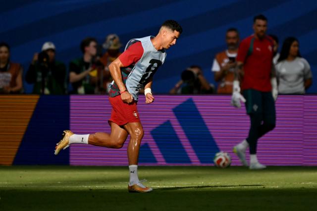 Portugal's forward #07 Cristiano Ronaldo warms up ahead of the 2026 World Cup Group K football match between Colombia and Portugal at the Miami Stadium in Miami Gardens on June 27, 2026.  (Photo by CHANDAN KHANNA / AFP)