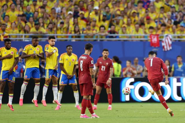 Portugal's forward #07 Cristiano Ronaldo takes a free kick during the 2026 World Cup Group K football match between Colombia and Portugal at the Miami Stadium in Miami Gardens on June 27, 2026.  (Photo by PATRICIA DE MELO MOREIRA / AFP)