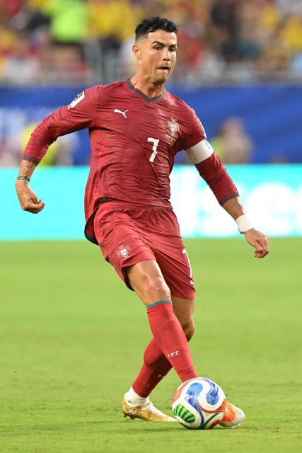 Portugal's forward #07 Cristiano Ronaldo kicks the ball during the 2026 World Cup Group K football match between Colombia and Portugal at the Miami Stadium in Miami Gardens on June 27, 2026.  (Photo by ROBERTO SCHMIDT / AFP)