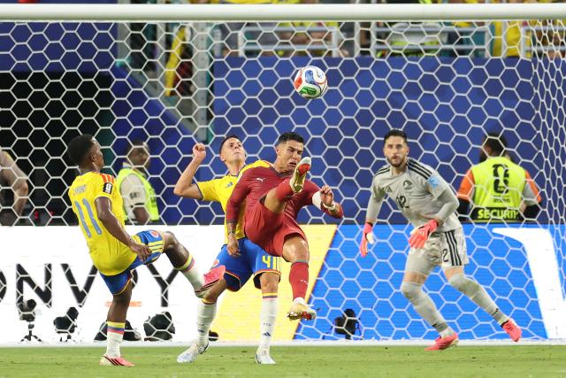Portugal's forward #07 Cristiano Ronaldo makes a bicycle kick and fails to score during the 2026 World Cup Group K football match between Colombia and Portugal at the Miami Stadium in Miami Gardens on June 27, 2026.  (Photo by PATRICIA DE MELO MOREIRA / AFP)