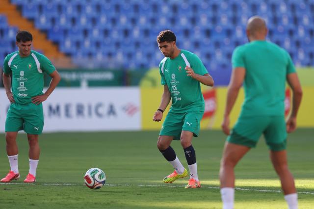 Morocco's defender #02 Achraf Hakimi kicks a ball during a training session at the Universitario stadium in San Nicolas de los Garza, Mexico on June 26, 2026.  (Photo by Julio Cesar AGUILAR / AFP)