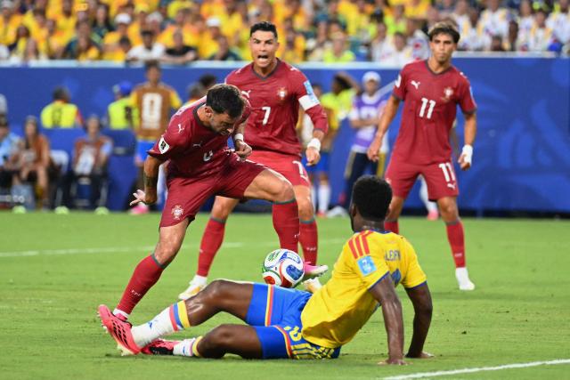 Portugal's midfielder #08 Bruno Fernandes controls the ball past Colombia's midfielder #16 Jefferson Lerma during the 2026 World Cup Group K football match between Colombia and Portugal at the Miami Stadium in Miami Gardens on June 27, 2026.  (Photo by ROBERTO SCHMIDT / AFP)