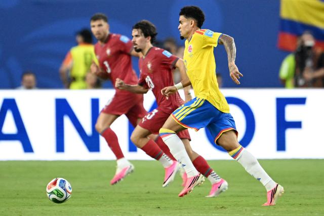 Colombia's forward #07 Luis Diaz runs with the ball during the 2026 World Cup Group K football match between Colombia and Portugal at the Miami Stadium in Miami Gardens on June 27, 2026.  (Photo by ROBERTO SCHMIDT / AFP)