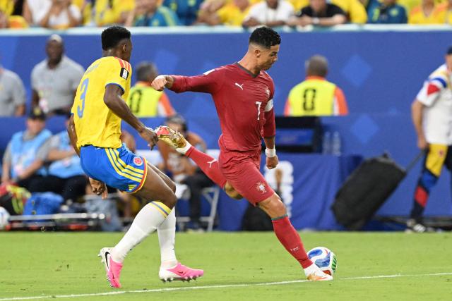 Portugal's forward #07 Cristiano Ronaldo kicks the ball during the 2026 World Cup Group K football match between Colombia and Portugal at the Miami Stadium in Miami Gardens on June 27, 2026.  (Photo by ROBERTO SCHMIDT / AFP)