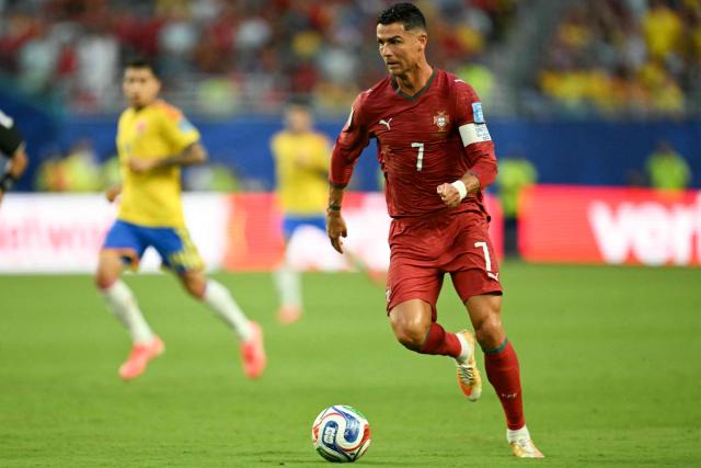 Portugal's forward #07 Cristiano Ronaldo runs with the ball during the 2026 World Cup Group K football match between Colombia and Portugal at the Miami Stadium in Miami Gardens on June 27, 2026.  (Photo by CHANDAN KHANNA / AFP)