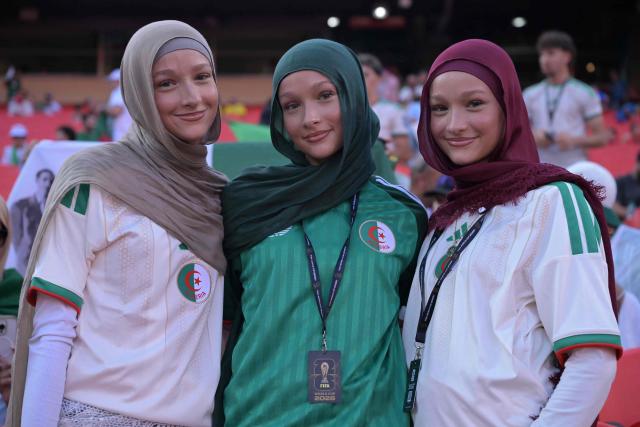 Algeria fans pose ahead of the 2026 World Cup Group J football match between Algeria and Austria at the Kansas City Stadium in Kansas City on June 27, 2026.  (Photo by JUAN MABROMATA / AFP)