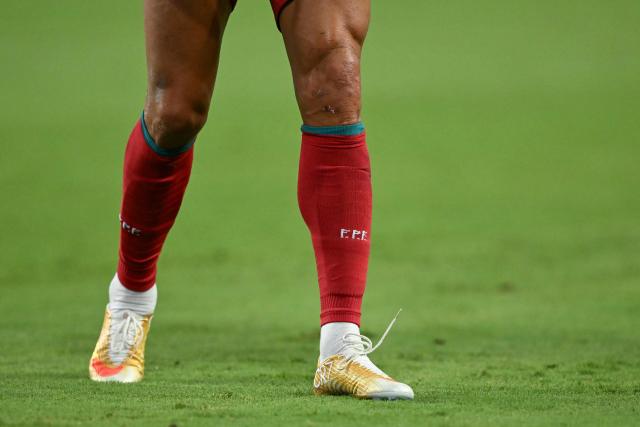 A view of the boots of Portugal's forward #07 Cristiano Ronaldo at the halftime of the 2026 World Cup Group K football match between Colombia and Portugal at the Miami Stadium in Miami Gardens on June 27, 2026.  (Photo by CHANDAN KHANNA / AFP)