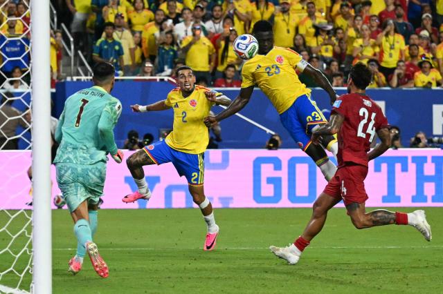 Colombia's defender #23 Davinson Sanchez scores a goal which was later disallowed after a VAR review during the 2026 World Cup Group K football match between Colombia and Portugal at the Miami Stadium in Miami Gardens on June 27, 2026.  (Photo by CHANDAN KHANNA / AFP)