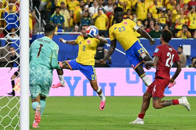 Colombia's defender #23 Davinson Sanchez scores a goal which was later disallowed after a VAR review during the 2026 World Cup Group K football match between Colombia and Portugal at the Miami Stadium in Miami Gardens on June 27, 2026.  (Photo by CHANDAN KHANNA / AFP)