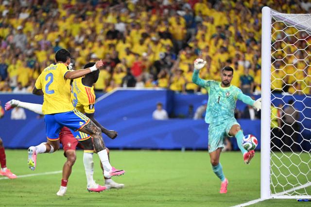 Colombia's defender #23 Davinson Sanchez scores a goal which was later disallowed after a VAR review during the 2026 World Cup Group K football match between Colombia and Portugal at the Miami Stadium in Miami Gardens on June 27, 2026.  (Photo by ROBERTO SCHMIDT / AFP)