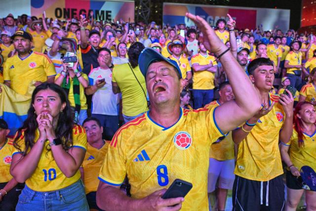 Colombia fans react while watching the 2026 FIFA World Cup Group K match between Colombia and Portugal during a fan gathering at the FIFA Fan Festival in Miami, Florida, on June 27, 2026. (Photo by GIORGIO VIERA / AFP)