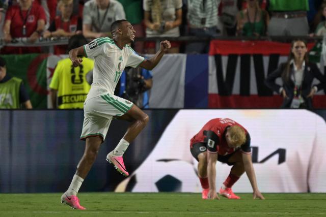 Algeria's defender #17 Rafik Belghali celebrates scoring his team's first goal during the 2026 World Cup Group J football match between Algeria and Austria at the Kansas City Stadium in Kansas City on June 27, 2026.  (Photo by JUAN MABROMATA / AFP)