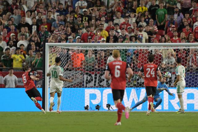 Austria's midfielder #09 Marcel Sabitzer kicks scores his team's second goal during the 2026 World Cup Group J football match between Algeria and Austria at the Kansas City Stadium in Kansas City on June 27, 2026.  (Photo by JUAN MABROMATA / AFP)