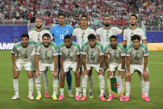 (Bottom row, from L) Algeria's midfielder #8 Houssem Aouar, Algeria's defender #13 Jaouen Hadja, Algeria's defender #17 Rafik Belghali, Algeria's midfielder #10 Fares Chaibi, Algeria's forward #07 Riyad Mahrez, Algeria's midfielder #22 Ibrahim Maza, (top row, from L) Algeria's forward #09 Amine Gouiri, Algeria's goalkeeper #16 Oussama Benbout, Algeria's defender #02 Aissa Mandi, Algeria's midfielder #19 Nabil Bentaleb and Algeria's defender #21 Ramy Bensebaini pose ahead of the 2026 World Cup Group J football match between Algeria and Austria at the Kansas City Stadium in Kansas City on June 27, 2026. (Photo by JUAN MABROMATA / AFP)