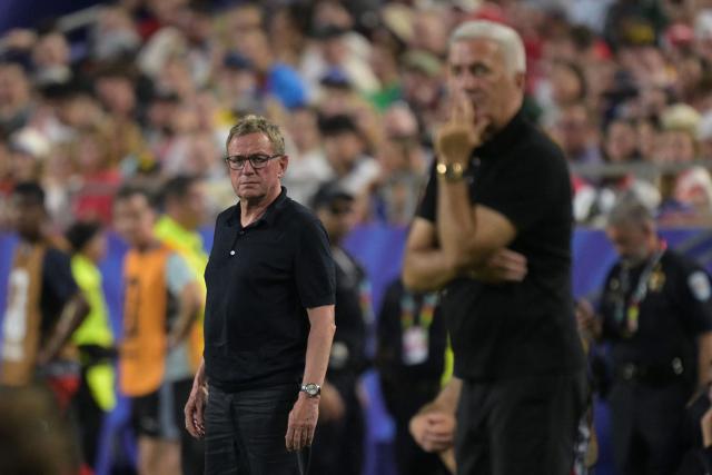 Austria's coach Ralf Rangnick and Algeria's Bosnian head coach Vladimir Petkovic  look on during the 2026 World Cup Group J football match between Algeria and Austria at the Kansas City Stadium in Kansas City on June 27, 2026.  (Photo by JUAN MABROMATA / AFP)