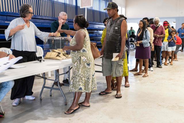 People vote at the Veyret-Kafoa polling station during New Caledonia's provincial elections in the Riviere Salee neighbourhood of Noumea, New Caledonia, on June 28, 2026. (Photo by Delphine MAYEUR / AFP)