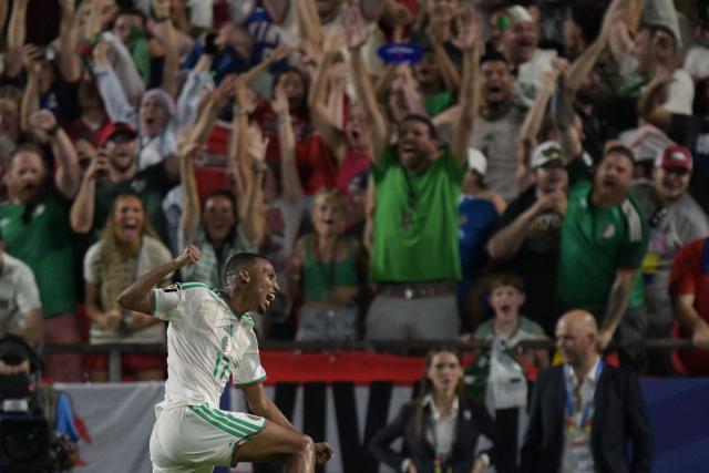 TOPSHOT - Algeria's defender #17 Rafik Belghali celebrates scoring his team's first goal during the 2026 World Cup Group J football match between Algeria and Austria at the Kansas City Stadium in Kansas City on June 27, 2026.  (Photo by JUAN MABROMATA / AFP)