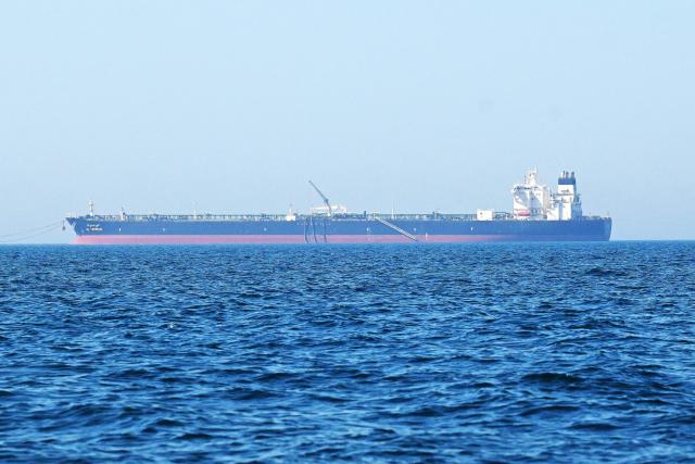 The 'Al-Yarmouk' oil tanker sails in the Arabian Gulf waters, off the coast of  Kuwait City on June 27, 2026. Kuwait came under attack from "hostile" missiles and drones, the country's army said on June 28, while in Bahrain air-raid sirens sounded following fresh US strikes against Iran. (Photo by YASSER AL-ZAYYAT / AFP) / 