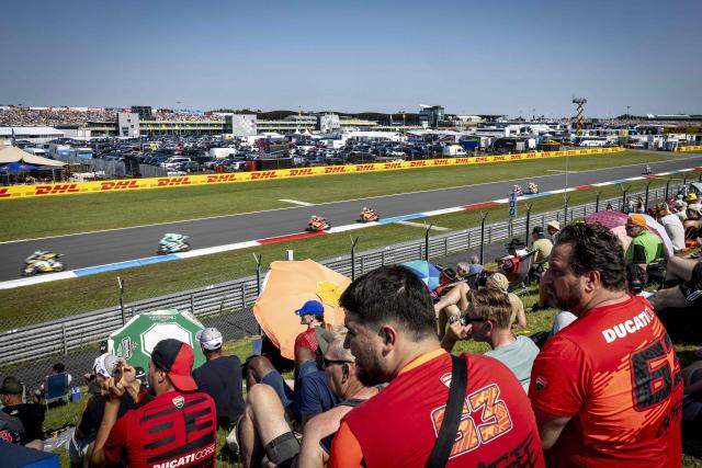 Supporters attend the Moto3 race during the 95th edition of the Dutch Motorcycle Grand Prix at the TT Circuit Assen, in Assen, on June 28, 2026. (Photo by Wouter de Wilde / ANP / AFP) / Netherlands OUT