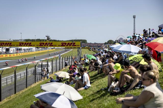 Supporters attend the Moto3 race during the 95th edition of the Dutch Motorcycle Grand Prix at the TT Circuit Assen, in Assen, on June 28, 2026. (Photo by Wouter de Wilde / ANP / AFP) / Netherlands OUT
