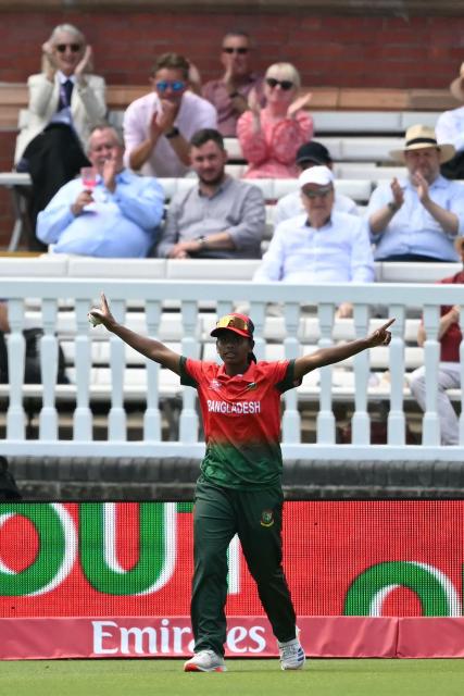 Bangladesh's Marufa Akter celebrates taking a catch to dismiss South Africa's Tazmin Brits during the ICC Women's T20 cricket world cup 2026 game between South Africa and Bangladesh, at Lord's in London on June 28, 2026. (Photo by JUSTIN TALLIS / AFP)