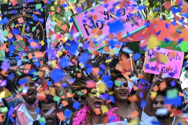 Gender rights activists and supporters of the LGBTQ community take part in a Pride March in Chennai on June 28, 2026. (Photo by R.Satish BABU / AFP)