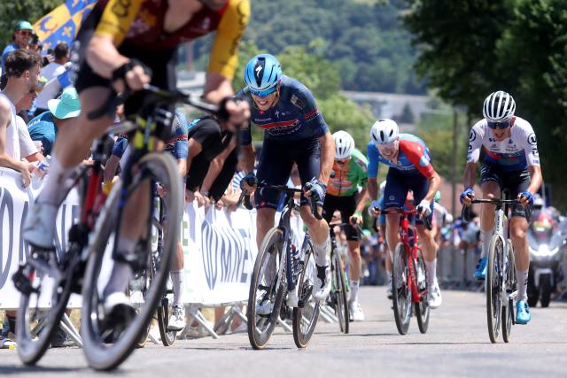 Soudal Quick-Step's French rider Paul Magnier (C) competes in the men's Elite Road Race, part of the French Cycling Championship 2026, near La Tour du Pin, central-eastern France on June 28, 2026. (Photo by Alex MARTIN / AFP)