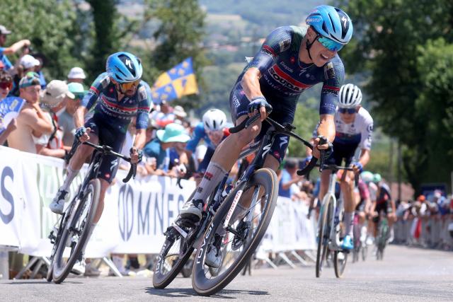 Soudal Quick-Step's French rider Paul Magnier (C) competes in the men's Elite Road Race, part of the French Cycling Championship 2026, near La Tour du Pin, central-eastern France on June 28, 2026. (Photo by Alex MARTIN / AFP)