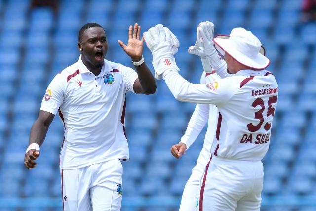 Jayden Seales (L) of West Indies celebrates the dismissal of Kasun Rajitha of Sri Lanka during the fourth day of the 1st cricket Test match between West Indies and Sri Lanka at Sir Vivian Richards Stadium in North Sound, Antigua and Barbuda, on June 28, 2026. (Photo by Randy Brooks / AFP)