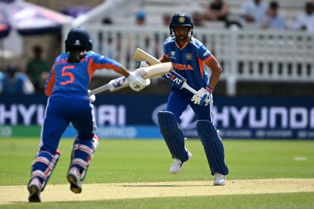 India's Jemimah Rodrigues (L) and India's captain Harmanpreet Kaur (R) take a single during the ICC Women's T20 cricket world cup 2026 game between Australia and India, at Lord's in London on June 28, 2026. (Photo by JUSTIN TALLIS / AFP)