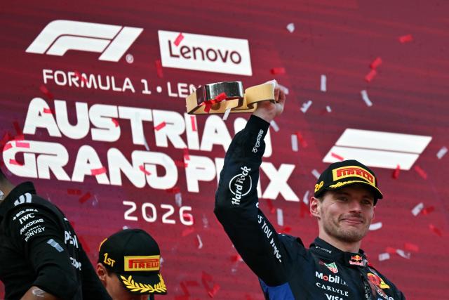 Second placed Red Bull Racing's Dutch driver Max Verstappen celebrates with his trophy on the podium after the Formula One Austrian Grand Prix at the Red Bull Ring race track in Spielberg, Austria on June 28, 2026. (Photo by Andrej ISAKOVIC / AFP)